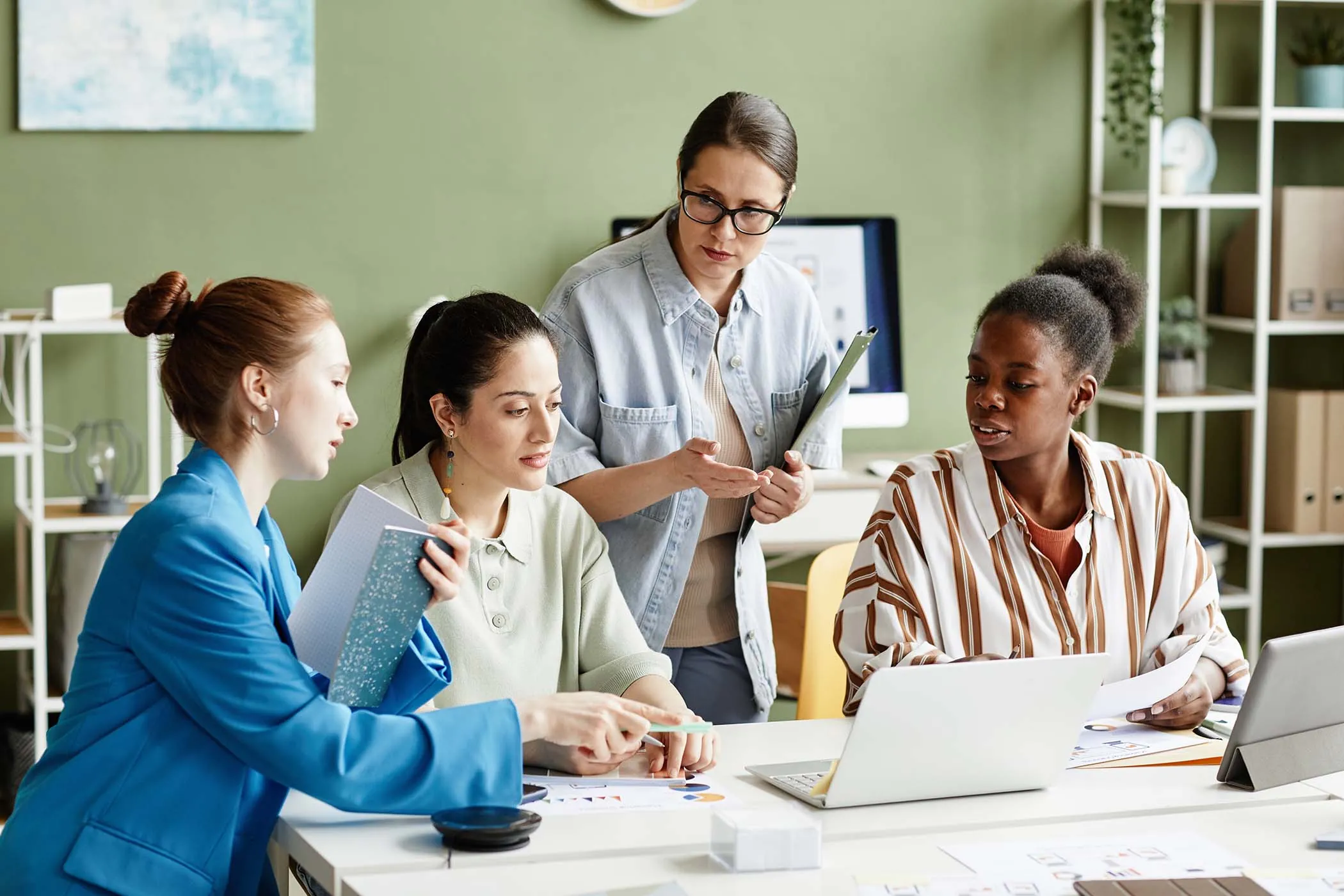 Professional content writing team collaborating on marketing strategy